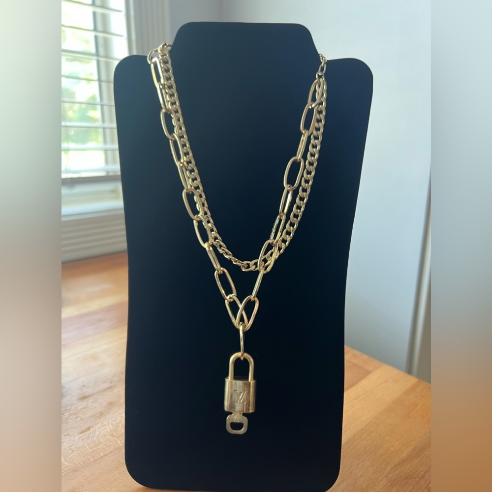 #312 Authentic Louis Vuitton Lock & Key on new unbranded necklace.